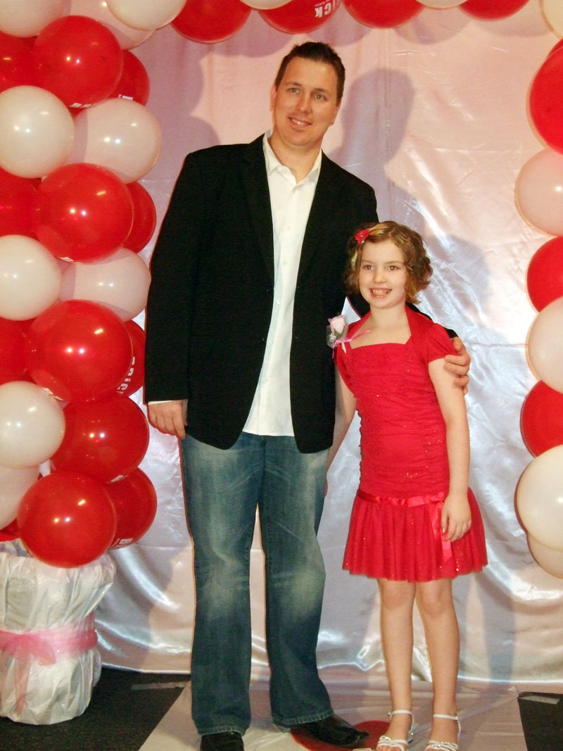 photo of a dad and daughter